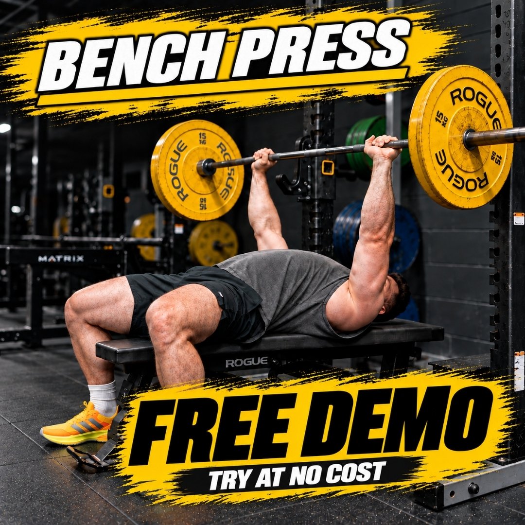 A man bench pressing a barbell with yellow Rogue weight plates in a gym setting, with large promotional text overlays reading 'BENCH PRESS' and 'FREE DEMO TRY AT NO COST' - Torokhtiy Weightlifting