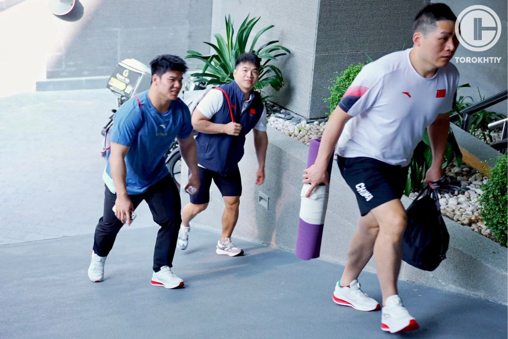 Chinese athletes from weightlifting team before competition